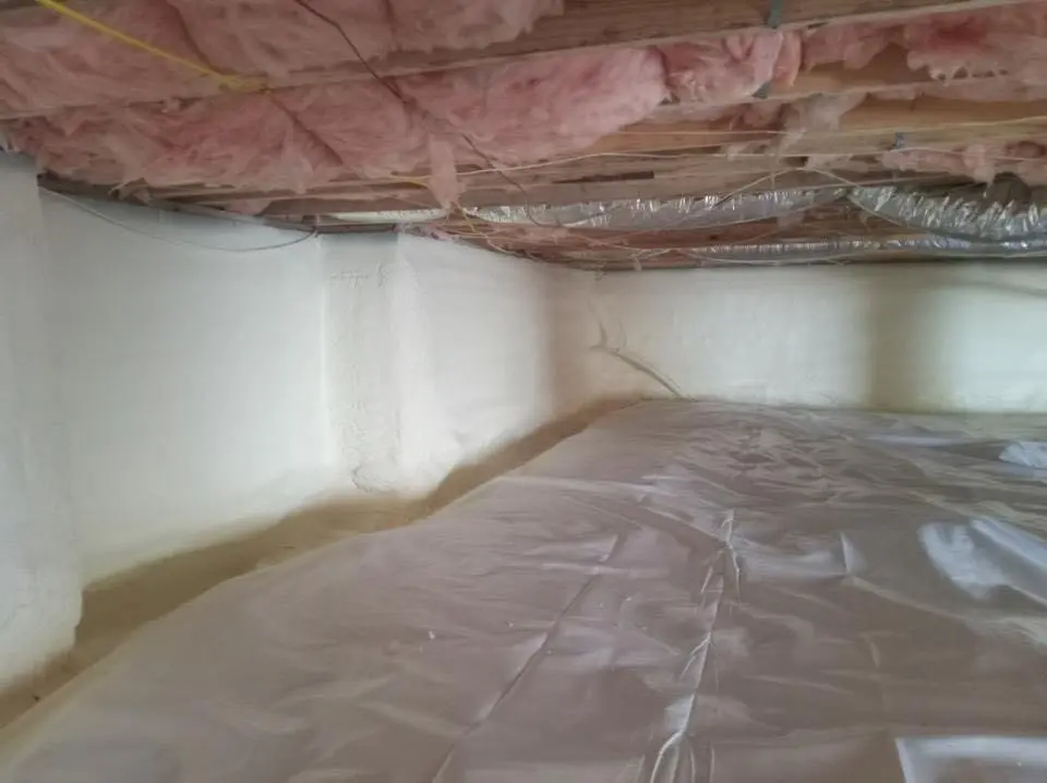 Crawl space encapsulation with closed-cell spray foam for Commercial Roof Restoration in Harrietstown